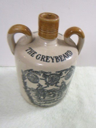 Stoneware whisky jug with handles: Stoneware whisky jug with handles-The Greybeard Heather dew Blend Scotch Whiskey 7 1/4" black writing