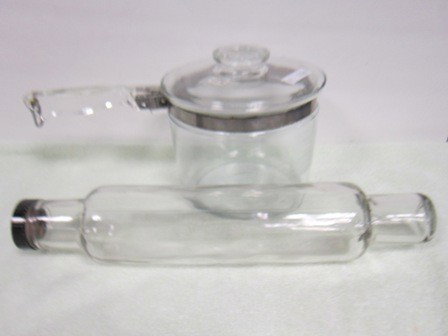 2 pc Pyrex sauce pot with lid: 2 pc Pyrex sauce pot with lid 6 tall- glass rolling pin-black plastic screw top on one end14"