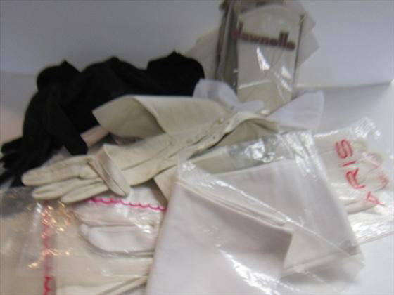 Bag lot of women's gloves: Bag lot of women's gloves assorted colors and lengths-leather and cloth- great lot
