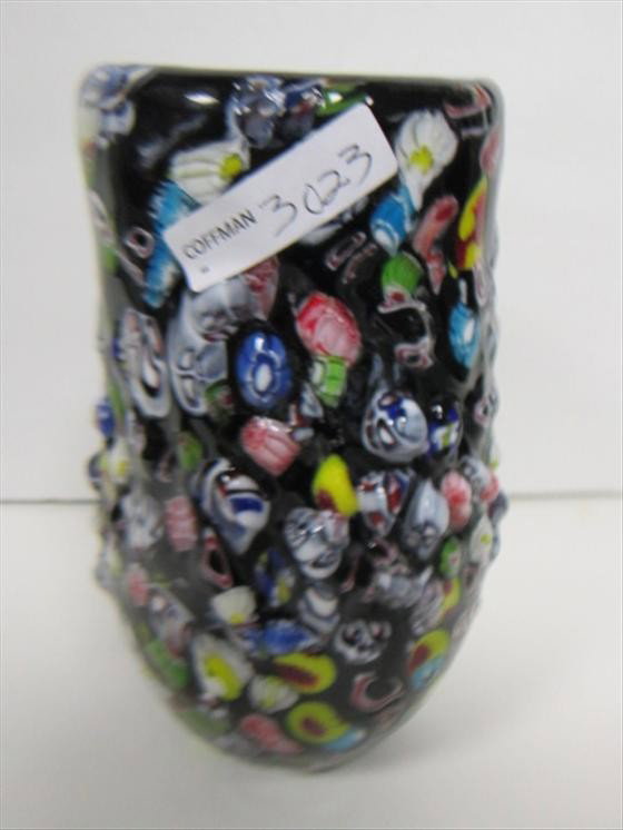 Murano glass vase blue inside: Murano glass vase blue inside multi colored applied pieces on black backing-7 1/4"