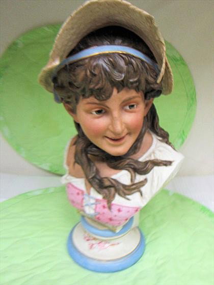 Bust of lady with straw hat: Bust of lady with straw hat long brown hair with pink white and blue bodice - bisque porcelain13 1/2" - R. Moeller impressed on side