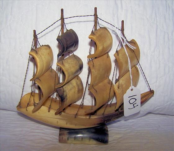 Hand carved sailing ship by Inuit: Hand carved sailing ship by Inuit of Alaska, very old, wade of Walrus Tusk, the masts are made of wood and the rigging of twisted wire