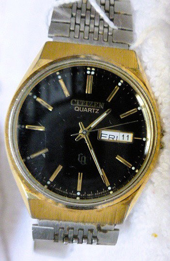 Citizen Quartz watch with date: Citizen Quartz watch with date and date black face gold tone bezel silver tone band - Water re3stistant - 60853957