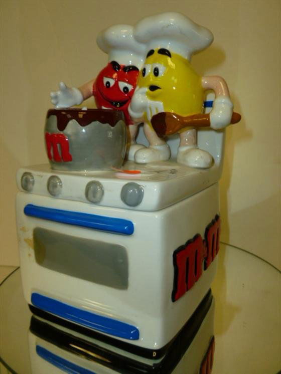 M & M Stove biscuit/cookie/candy jar-2001: M & M candy stove biscuit cookie or candy jar-2001- red and yellow M&M guys with chef hats