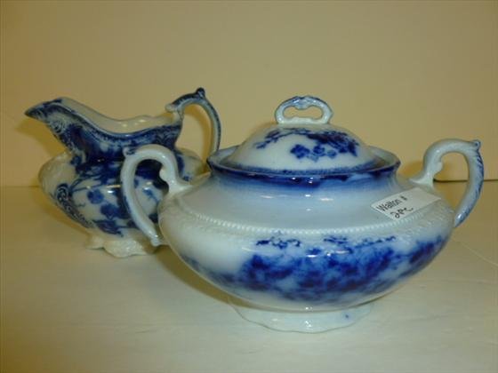 2 pc creamer and lidded sugar- flow blue: 2 pc creamer and lidded sugar- flow blue-Johnson Brothers England- 4 tall- very good condition