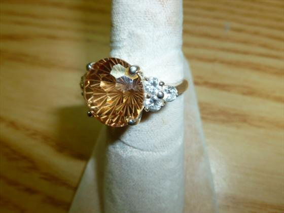 Judith Ripka Sterling ring: Judith Ripka Sterling ring with large attractive color stone and cz's 1/2" center stone-. 3 ounce total