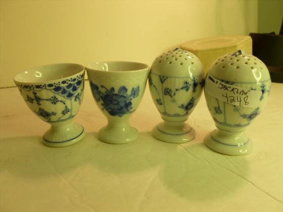 4 piece salt and pepper and egg cups: 4 piece salt and pepper and egg cups - blue and white onion pattern Royal Copenhagen - 2 1/2 to 3 tall - good condition