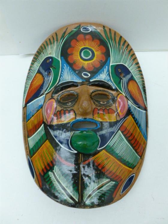 Hand painted wall hanging mask: Hand painted wall hanging mask made of pottery or clay with multi colored birds and designs - 8 1/2 long no marks