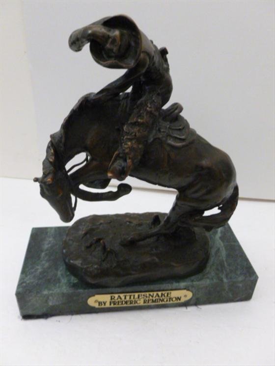 Remington Bronze - Rattlesnake: Remington Bronze - Rattlesnake by Frederic Remington - marked on base in front - marble base in green - 8 by 9 - good condition