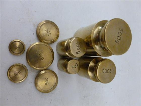 Set of 9 brass scale weights: Set of 9 brass scale weights - 5 gram to 500 grams - round flat and milk can style