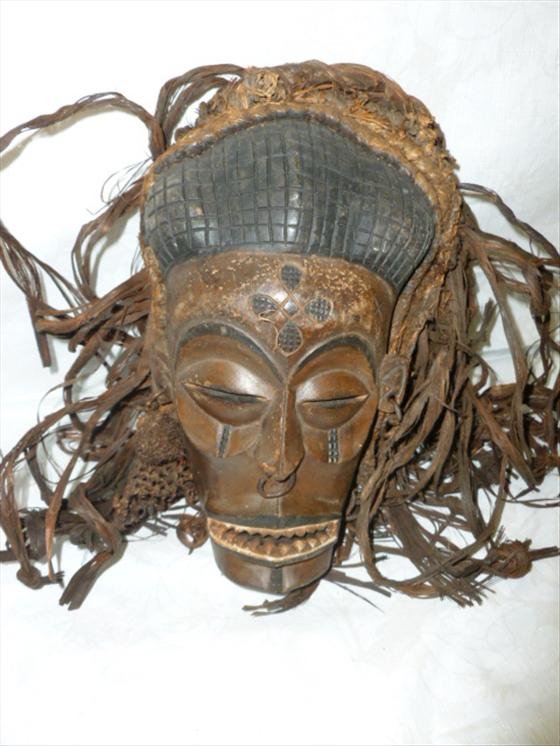Songye Tribe mask: Songye Tribe mask with hat and fiber carved wood paint and rope -10 1/2 long