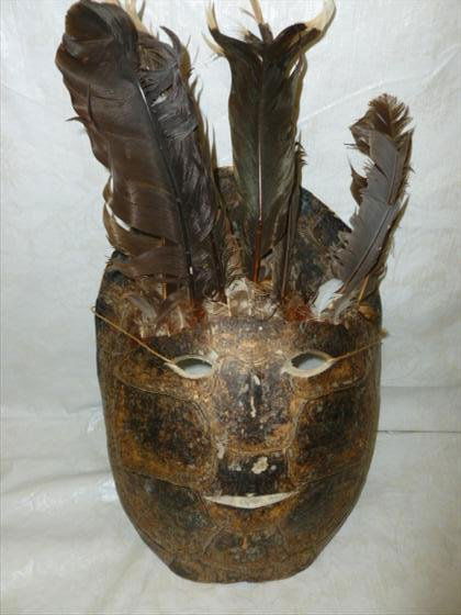 Turtle shell mask with feathers slits for eyes and mout: Turtle shell mask with feathers slits for eyes and mouth 16 long