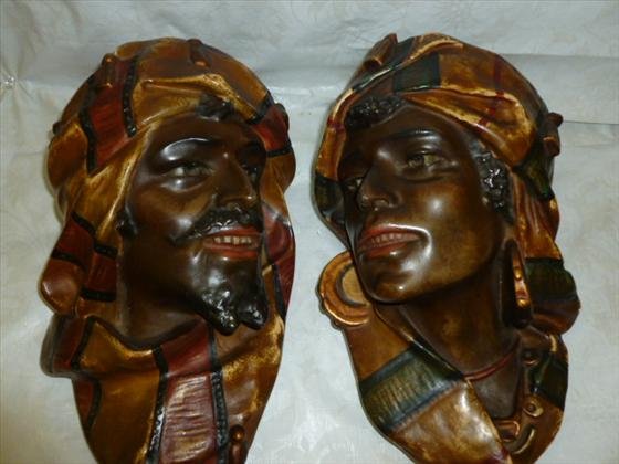 Pair hanging Busts Arabian Man & Woman: Pair hanging Busts Arabian Man & Woman hard plaster painted decoration 12 long early 20th century few minor wear spots
