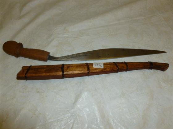 Wood case with curved knife 19 long - blade sharp: Wood case with curved knife with wood handle braided leather pieces around the case- 19 long - blade sharp