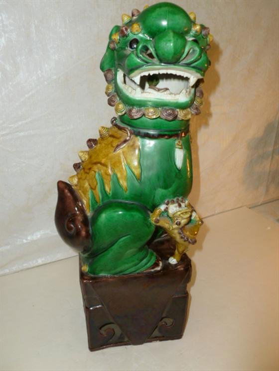 Vintage Porcelain Foo Dog figure: Vintage Porcelain Foo Dog figure on square base- green brown and white in color nice details-19 tall-great piece