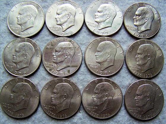 12 Eisenhower Clad Dollars: 12 Eisenhower Clad Dollars - 5 1976 and one each 1971, 1972, 1971D, 1974D, 1974, 1977, 1978D