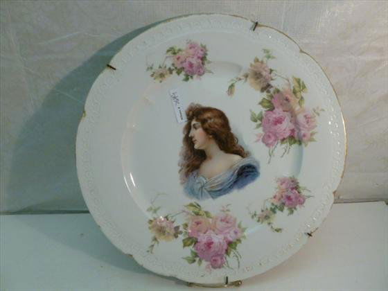 Large hand painted porcelain portrait charger: Large hand painted porcelain portrait charger-Carmen Bavaria-colored flowers gold trim-14" dia with wire hanger