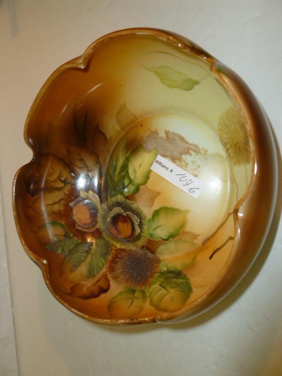 Noritake bowl embossed flowers: Noritake bowl embossed flowers in green and brown on tan background round scalloped top 7 1/4 dia.3 tall-not much wear