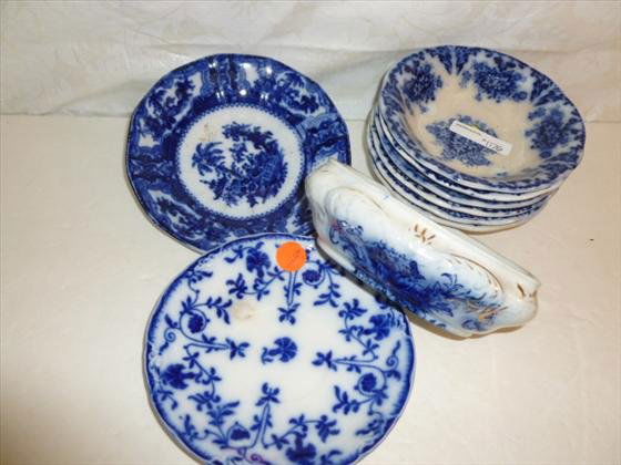 Assorted lot of flow blue dishes and bowls: Assorted lot of flow blue dishes and bowls- different patterns and makers-some staining no cracks or chips- buying as is