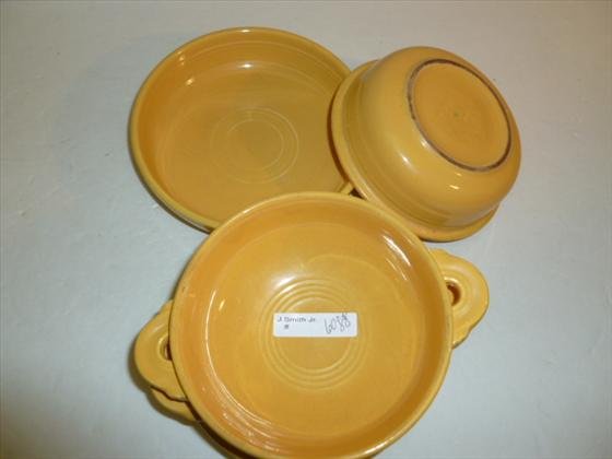 5 piece Fiesta ware bowls: 5 piece Fiesta ware bowls on golden yellow color-impressed mark- 6 1/2 diam. with handles