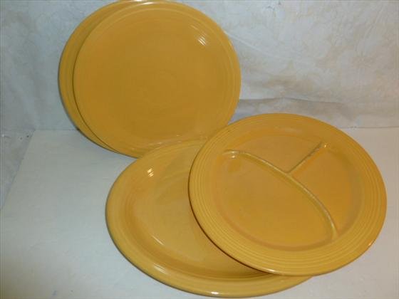 4 piece golden yellow Fiesta ware dishes and platter: 4 piece golden yellow Fiesta ware dishes and platter- blue mark- no chips or cracks
