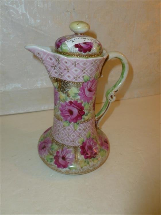 Porcelain chocolate pot pink and green flowers embossed: Porcelain chocolate pot pink and green flowers embossed beading no names or marks- 9"-very good condition