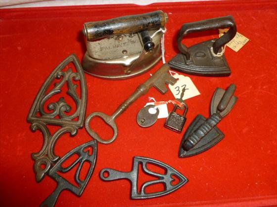 Bag lot antiques metal iron trivets locks and key- Asbe: Bag lot antiques metal irons trivets locks and key- Asbestos 4" 1900- Hallow grip 2 7/8 child's -iron art trivets nice lot good condition