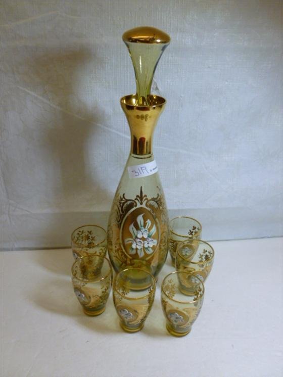 7 pc set Czech/Italy style decanter with stopper and sh: 7 pc set Czech/Italy style decanter with stopper 11 1/2 tall and 6 small shot 2 1/2 size glasses- gold with gold trim and applied enameled flowers