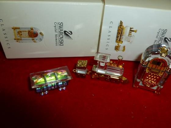 4 piece Swarovski crystals- juke box and 3 piece train : 4 piece Swarovski crystals- juke box and 3 piece train set - with 2 boxes- like new condition-