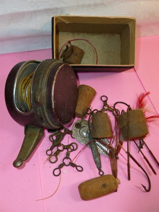 Antique fishing reel and lures and corks- Reel Heddon: Antique fishing reel and lures and corks- Reel Heddon Automatic free stripping #87- needs a little cleaning-good piece