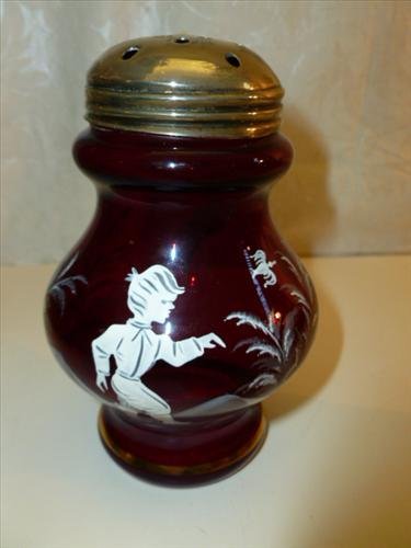 Ruby red Mary Gregory style sugar shaker boy with: Ruby red Mary Gregory style sugar shaker boy with trees and bird -hand painted- metal top- 5 tall