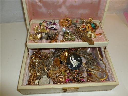 Large jewelry box full of assorted jewelry all kinds: Large jewelry box full of assorted jewelry all kinds colors shapes and pieces- fun box