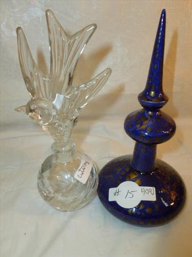 2 perfumes-Mikasa crystal with bird stopper 6 1/2: 2 perfumes-Mikasa crystal with bird stopper 6 1/2 both with gold fleck-s porcelain- 7 1`/2 tall both good condition