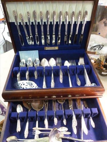 Wood flatware box full of silver plated: Wood flatware box full of silver plated flatware and serving pieces-- Community- flower design-service for 12 plus extra- nice complete set