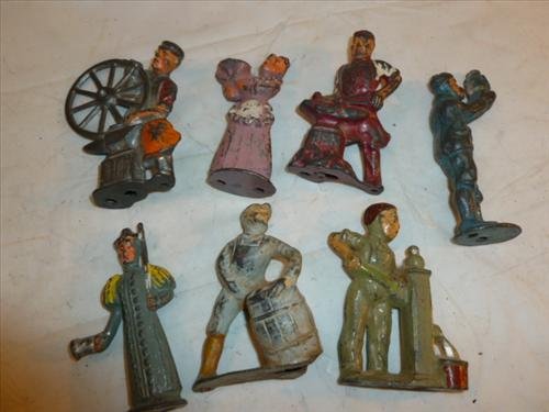 7 pc Hallow lead figures-USA- original no repaint-all: 7 pc Hallow lead figures-USA- original no repaint-all working people- some paint 1 has a crack in neck