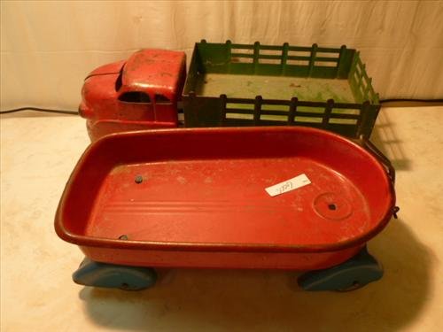 2 pc Wyandotte 1930's stake truck&pressed steel wagon: 2 pc Wyandotte 1930's stake truck and pressed steel wagon pull toy- red blue green all original no repaint-10 1/2-13 1/2 long-metal wheel