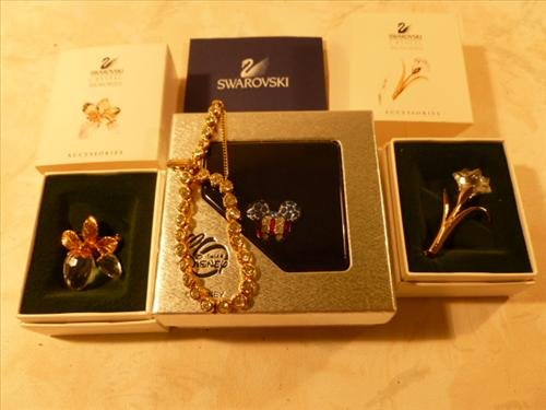 3 Swarovski crystal pcs-NIB: 3 Swarovski crystal pcs- new in box/papers- flower- berries and Walt Disney red white and blue Mickey Mouse head-Tennis Bracelet
