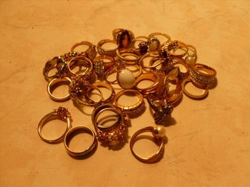 Nice large assortment of ladies rings with stones: Nice large assortment of ladies rings with stones- some gold gilled some plated maybe a hidden treasure- all nice pieces and stones