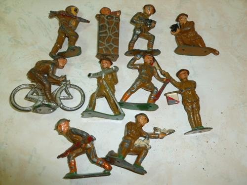 10 pc Barclay Manoil misc figures- weapons bike flags: 10 pc Barclay Manoil misc figures- weapons bike flags and more- original no repaint-