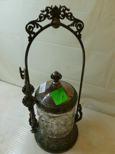 Silver plate and crystal pickle caster with lid and: Silver plate and crystal pickle caster with lid and tongs- button and star pattern made in USA- 12 tall pattern base and top