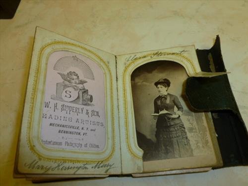 Old photo album with 5 photos-case is worn and: Old photo album with 5 photos- case is worn and torn - pictures ok- 3 by 4 1/2- green in color
