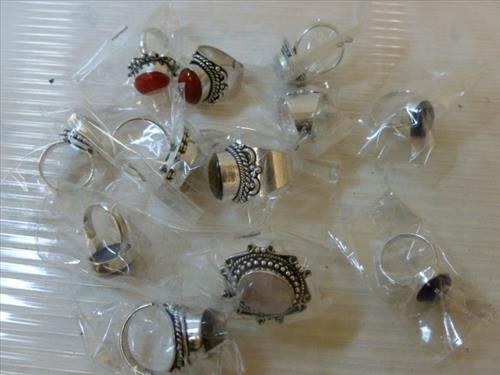 12 new rings with different colored stone- some marked: 12 new rings with different colored stone- some marked 925 -new in bag
