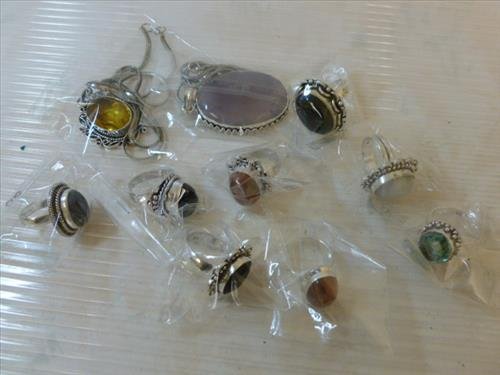 10 pcs- 2 necklaces 8 rings- colored stones new in bag: 10 pcs- 2 necklaces 8 rings- colored stones new in bag some marked 925