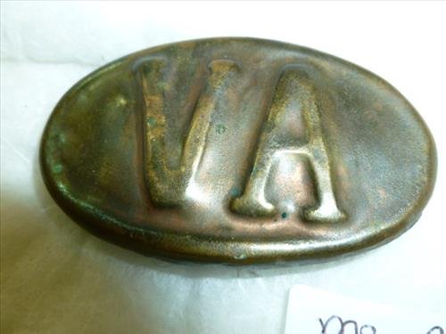 Brass belt buckle with VA on the front oval shaped: Brass belt buckle with VA on the front oval shaped-3 hooks on back- 2 1/2 long- solid- Circa???