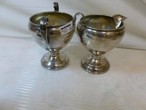 Sterling silver creamer and sugar- #2477-dent in the: Sterling silver creamer and sugar- #2477-dent in the bottom of both-164 grams total- no weighted bottoms no designs