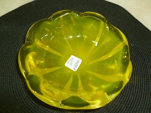 Vintage yellow Vaseline glass white opal on underside: Vintage yellow Vaseline glass white opal on underside- round scalloped shape- 2 1/4 BY 6 3/4- polished bottom nice looking piece