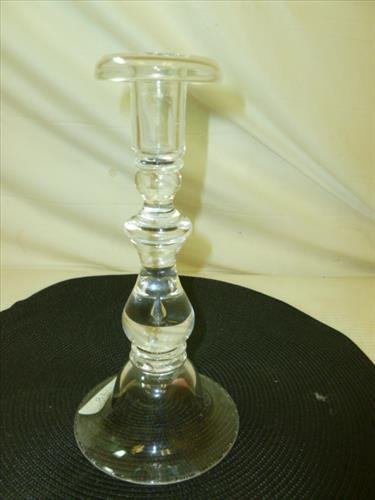 Signed Steuben clear crystal candlestick: Signed Steuben clear crystal candlestick- with teardrop bubble inside toward the base-9"- rolled top