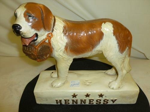 Vintage Chalk advertising piece- Hennessy St. Bernard: Vintage Chalk advertising piece- Hennessy St. Bernard- 11 by 11- some wear and a few chips- original paint- overall nice piece