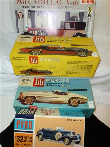 4 model car kits-  in boxes not sealed- most parts (1 of 1)