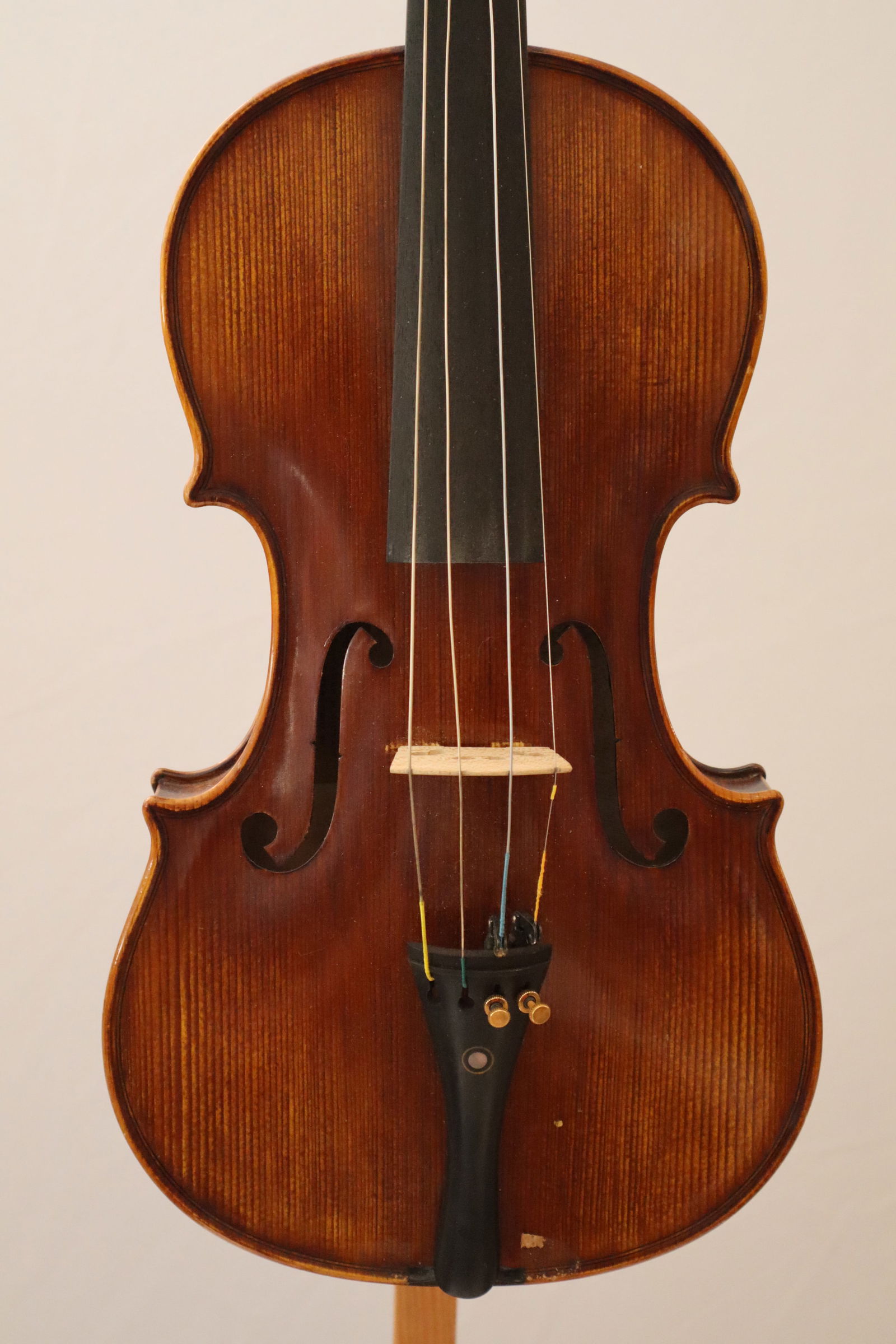 A Violin labeled Pierguiseppe Esposti: A full-sized 4/4/ violin labeled Pierguiseppe Esposti. Likely a copy. No visible cracks. Label reads Pierguiseppe Esposti Cremoninsis Facibat Anno. Measures 23.5x14x1.5